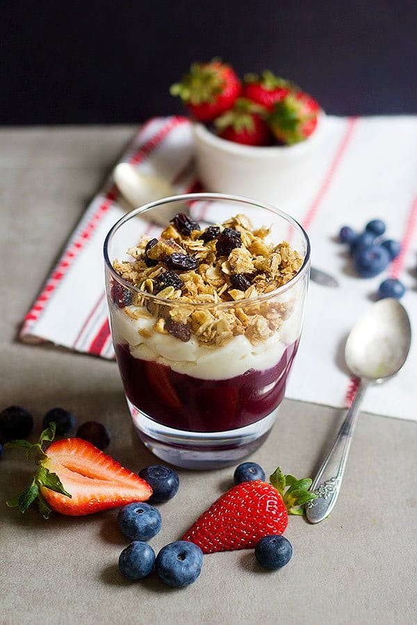 Start your day happily with a delicious Mixed Berry Granola Parfait. Delicious layers of mixed berries, yogurt alternative, and granola = perfection in every spoonful.