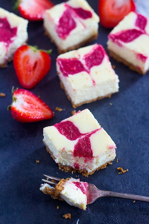 Strawberry Swirl Cheesecake Bars can be your easy, go to dessert recipe this summer. Everyone loves a creamy and luscious cheesecake topped with delicious homemade strawberry swirl.
