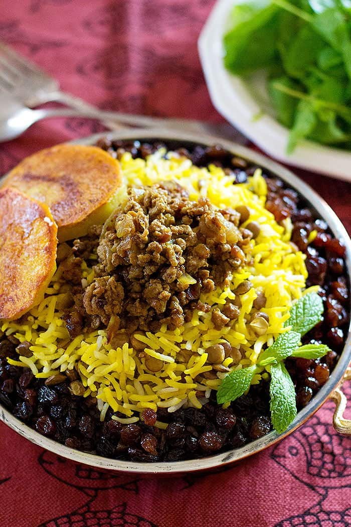Adas Polo - Persian Lentil Rice is perfect for a weeknight meal. Rice and lentils served with delicious beef and raisins make the perfect healthy meal!