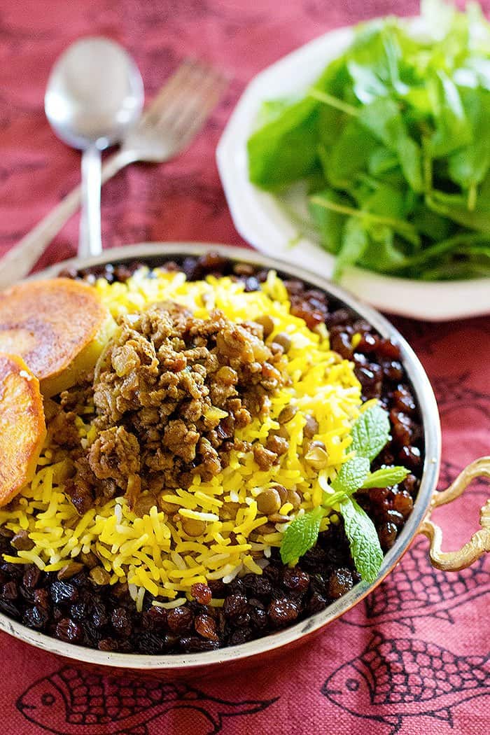 Adas Polo - Persian Lentil Rice is perfect for a weeknight meal. Rice and lentils served with delicious beef and raisins make the perfect healthy meal!