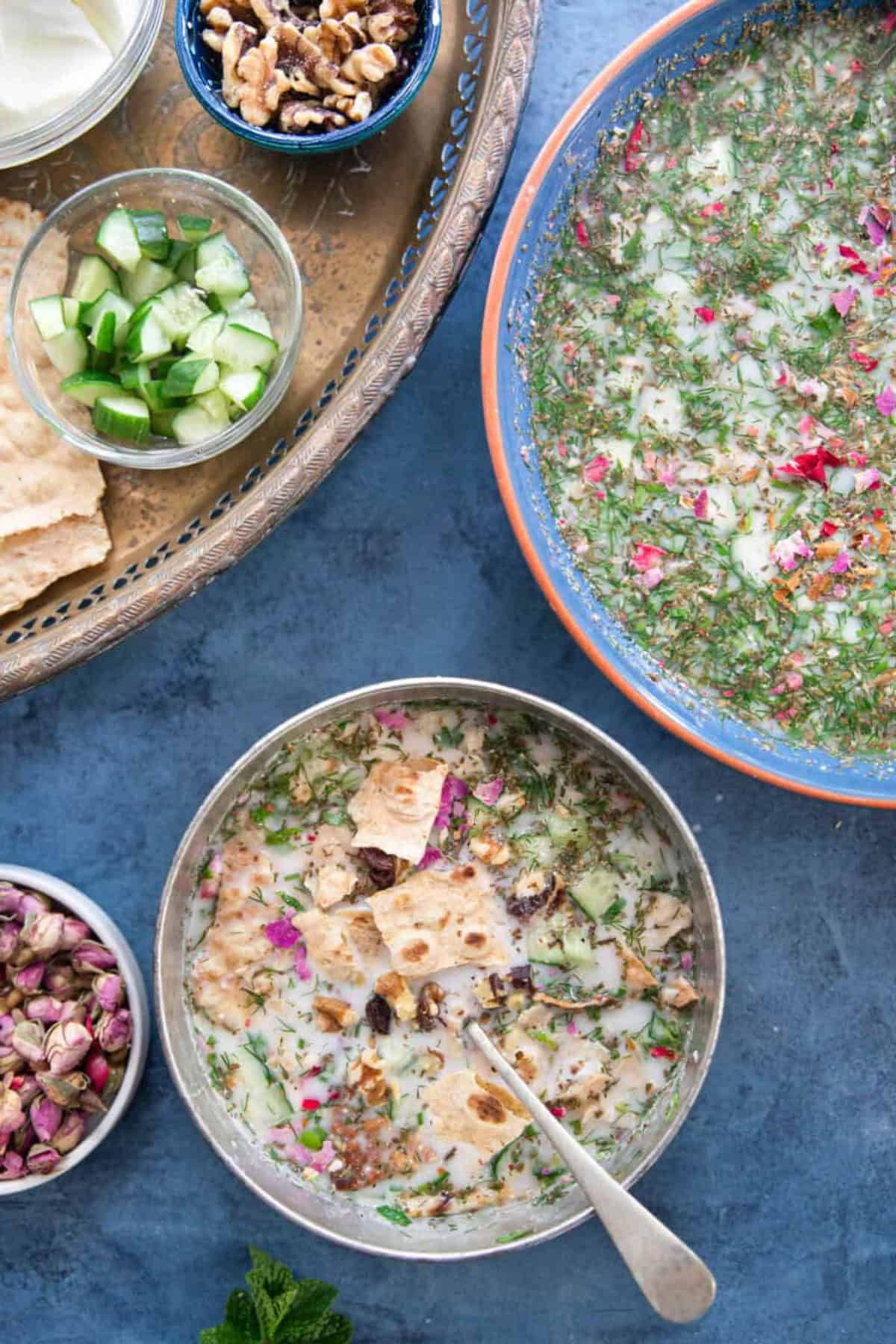 Stay cool this summer with this Persian cold yogurt soup called Abdoogh Khiar. This tasty yogurt soup is made with simple, natural and healthy ingredients and is ready in only 15 minutes.