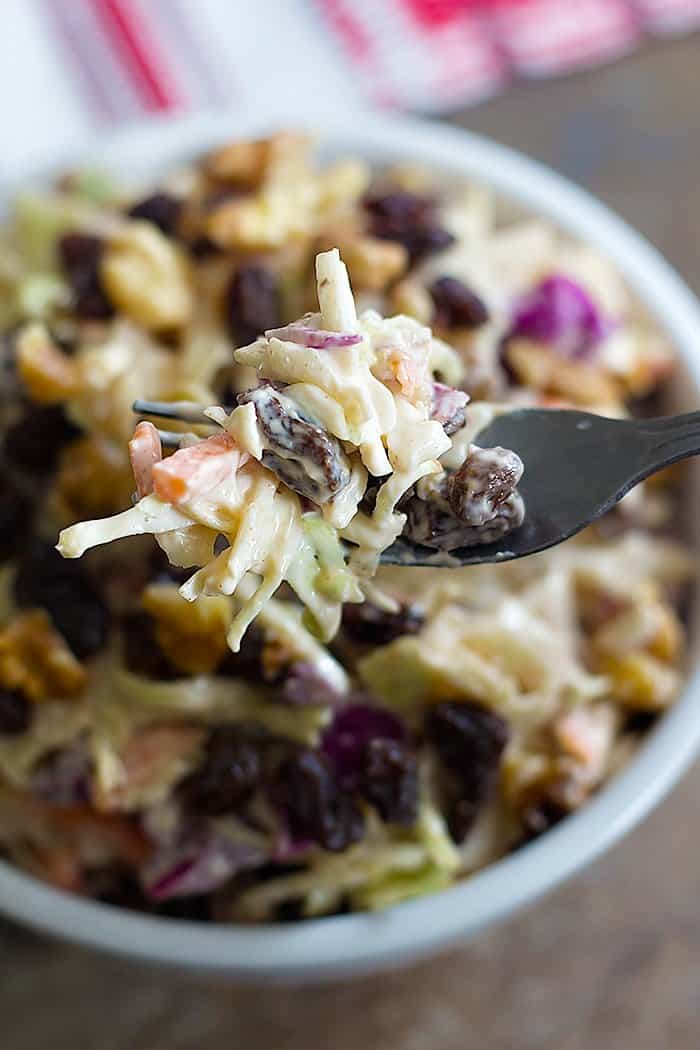 Walnut Raisin Coleslaw will be your new favorite barbecue side dish. Crunchy walnuts and sweet raisins give an extra layer of texture and flavor to your coleslaw!