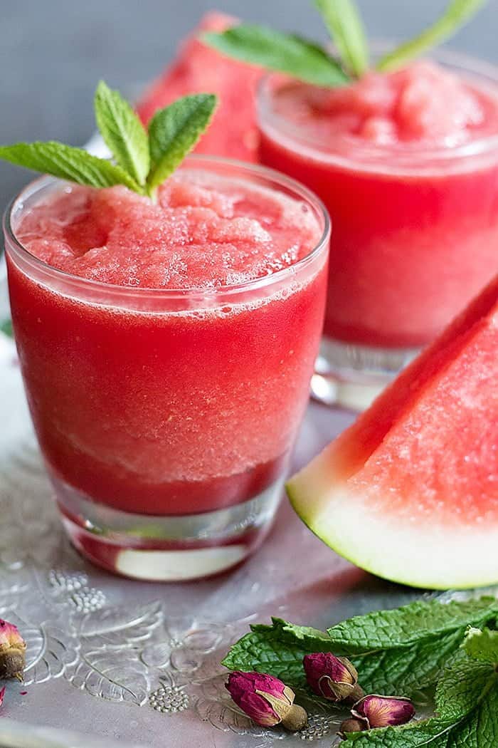 Watermelon Rose Slushie is great for summer. Juicy and sweet watermelon blended with rose water makes this a delicious natural drink for hot days! 