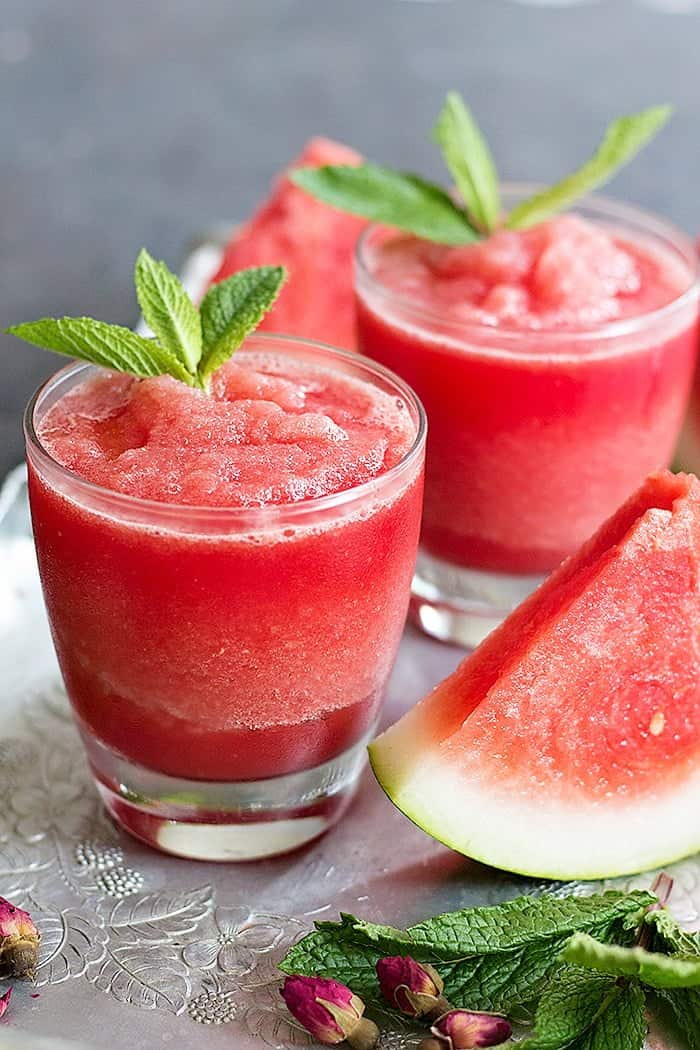 Watermelon Rose Slushie is great for summer. Juicy and sweet watermelon blended with rose water makes this a delicious natural drink for hot days! 