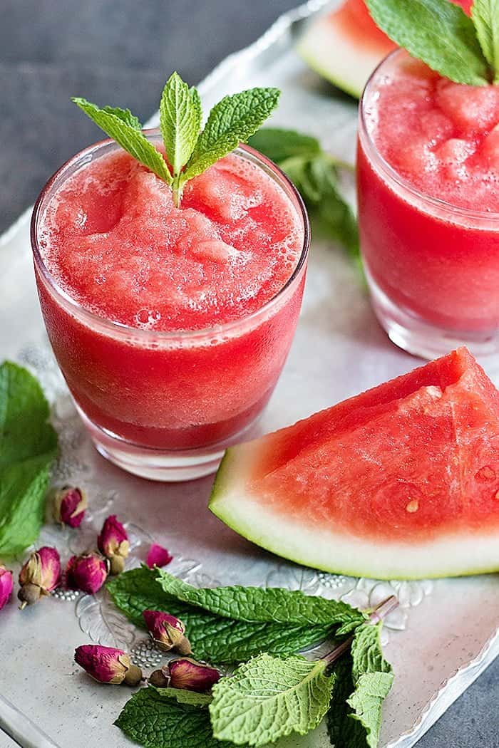 Watermelon Rose Slushie is great for summer. Juicy and sweet watermelon blended with rose water makes this a delicious natural drink for hot days! 