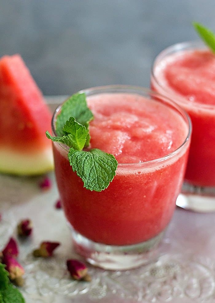 Watermelon Rose Slushie is great for summer. Juicy and sweet watermelon blended with rose water makes this a delicious natural drink for hot days! 