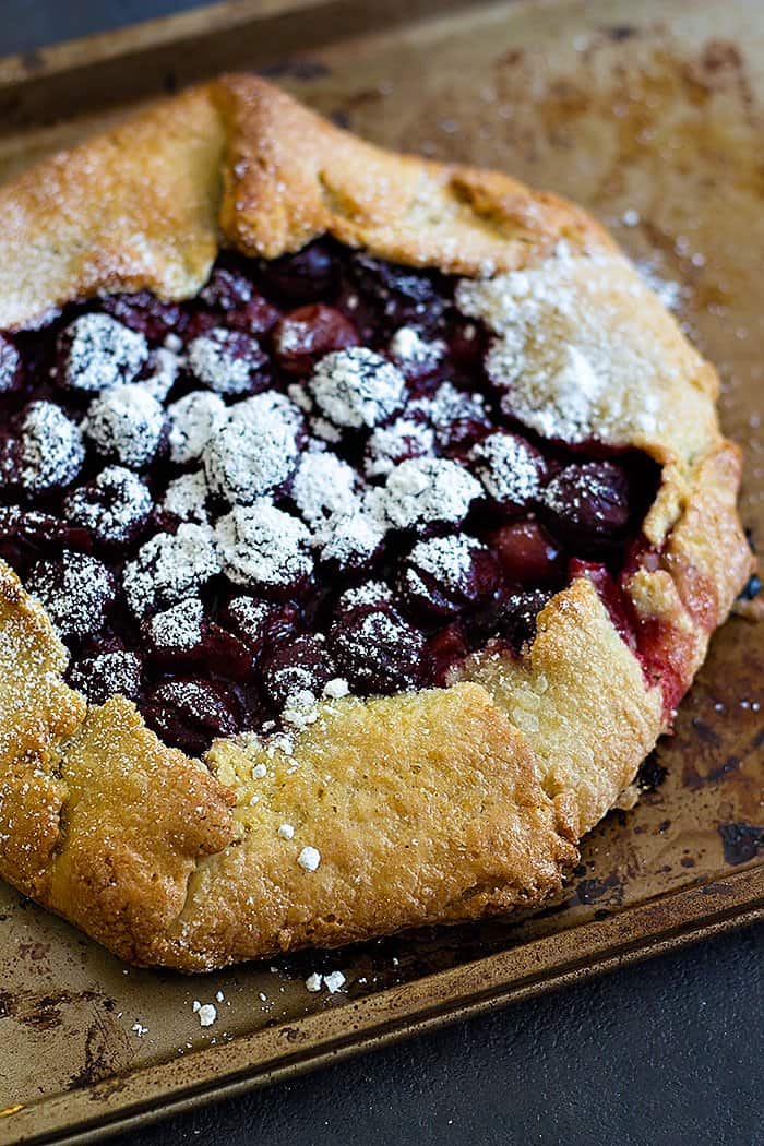 Sour cherry galette is one of my favorite summer treats! Galettes are free form tarts that can be filled with any fruits that are in season!