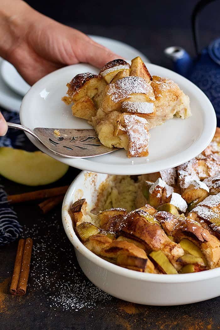 serve a slice of French toast bake on a white plate. 