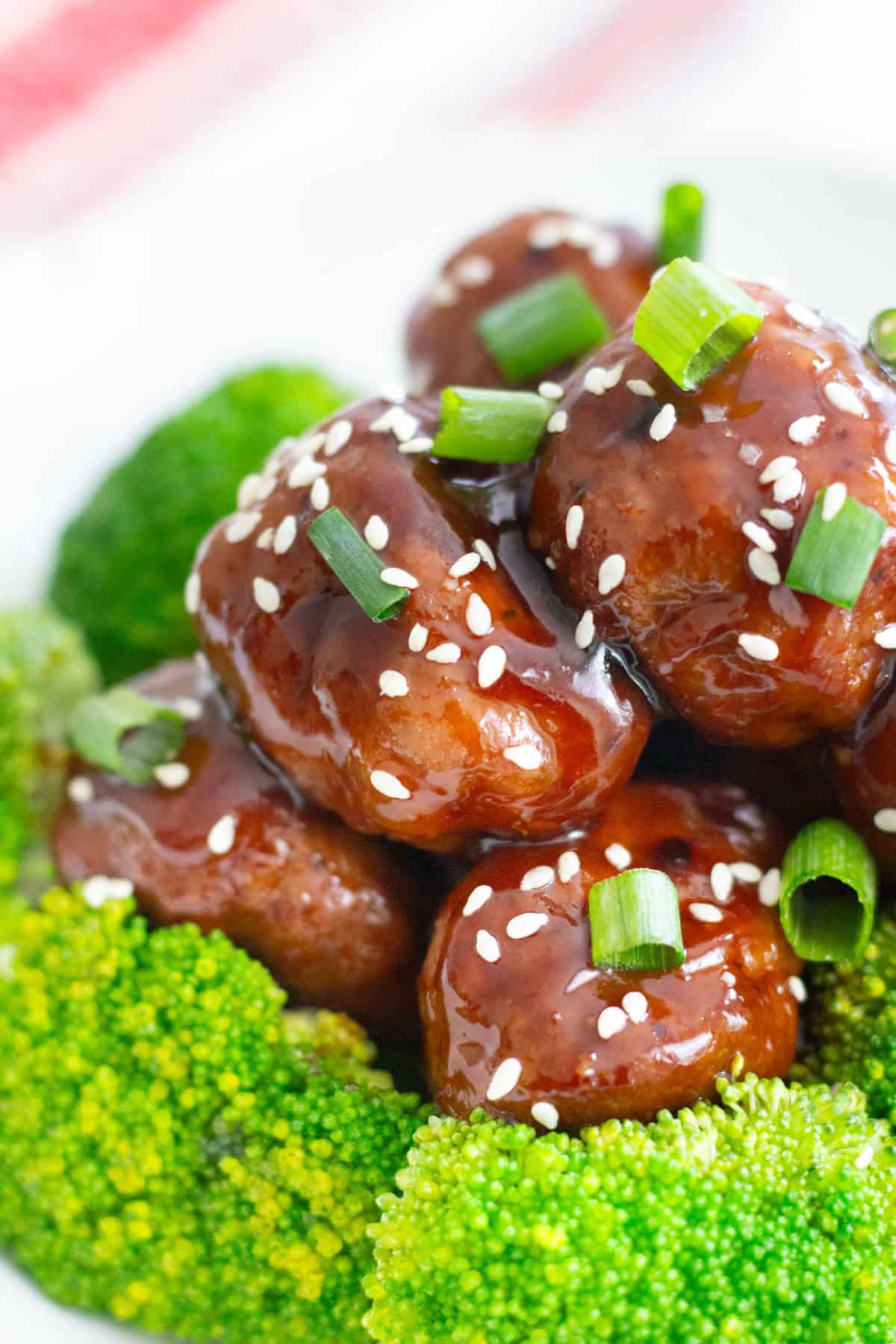 Bring amazing flavors to your usual meals with these Ginger Garlic Chicken Meatballs. These meatballs are light, delicious and smothered in homemade sauce!