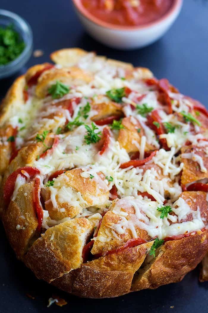 You only need a few ingredients to make this easy pizza pull apart bread recipe. 