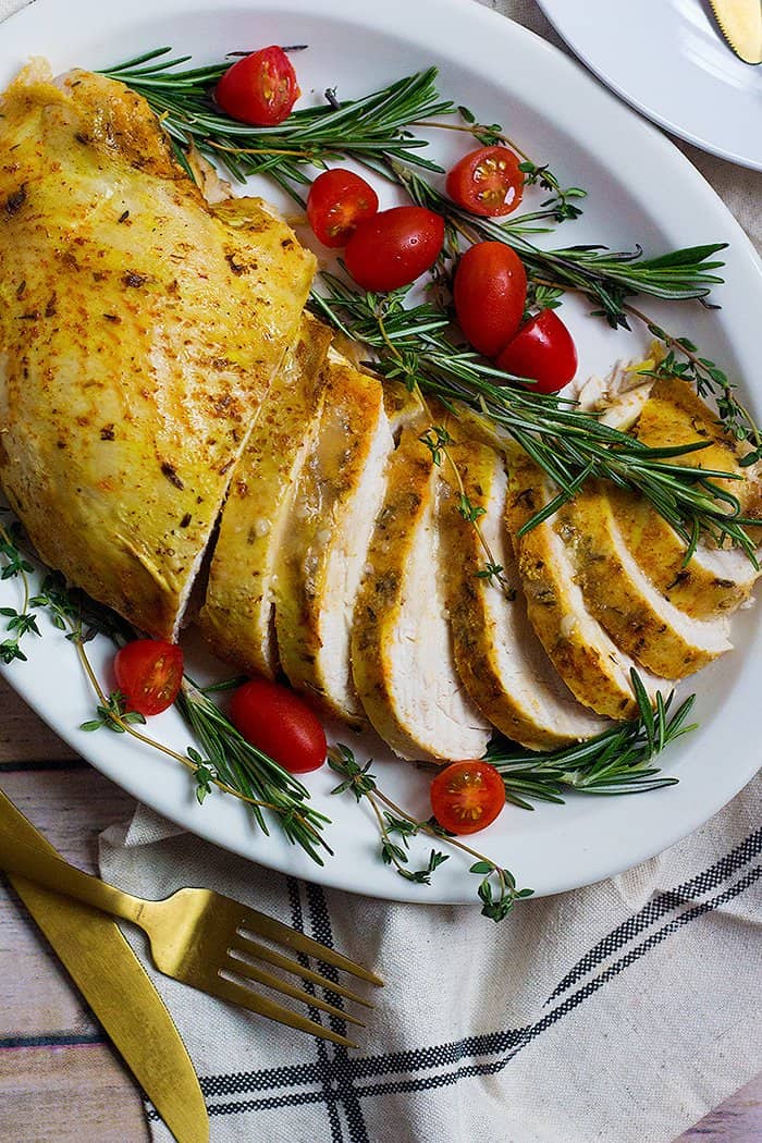 This slow cooker turkey breast recipe is simple method that will always give you juicy and moist turkey breast with minimal preparation. It's perfect for Thanksgiving and the holidays!