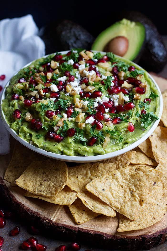 Pomegranate Guacamole served with tortilla chips.