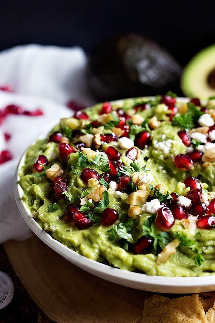 Pomegranate Guacamole - Avocados mashed with lime, pomegranate and walnuts.