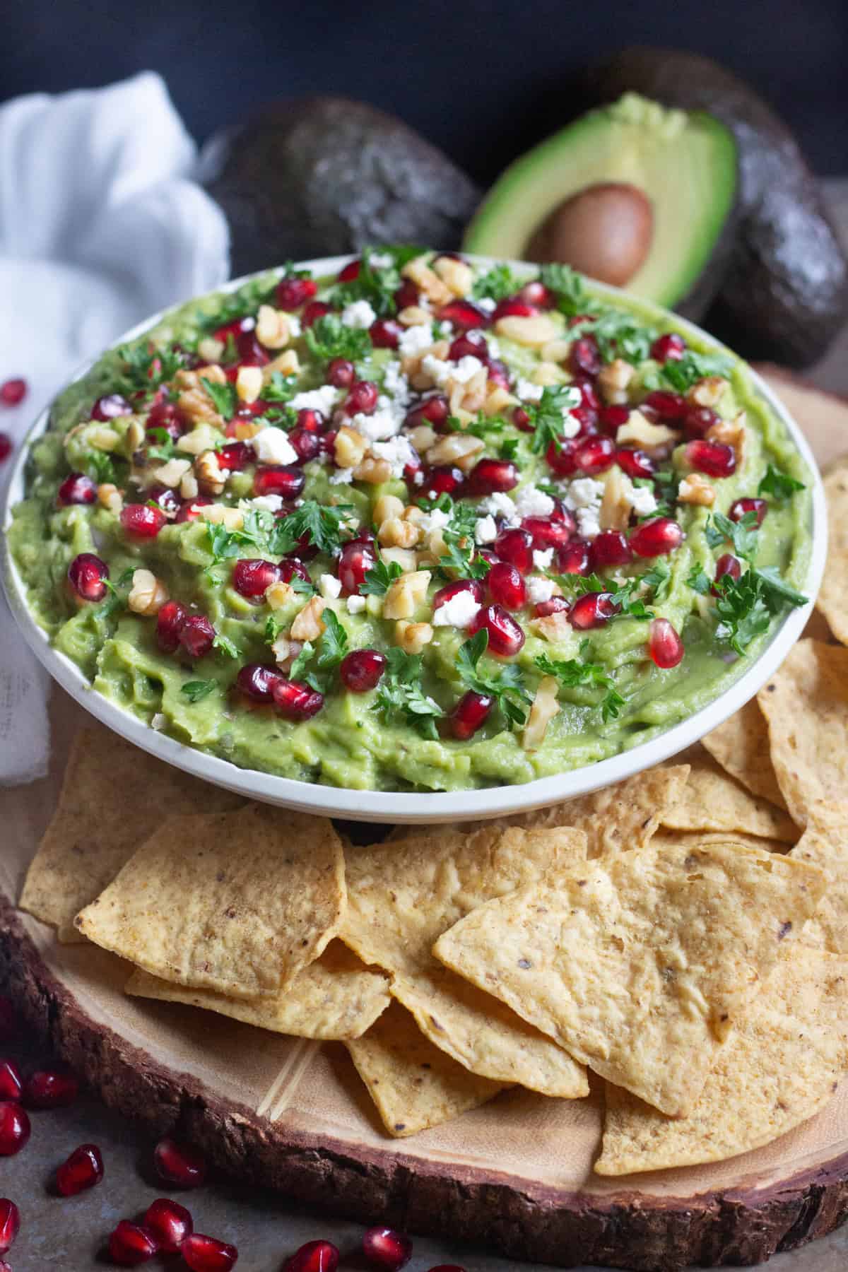 Pomegranate Guacamole served with tortilla chips.