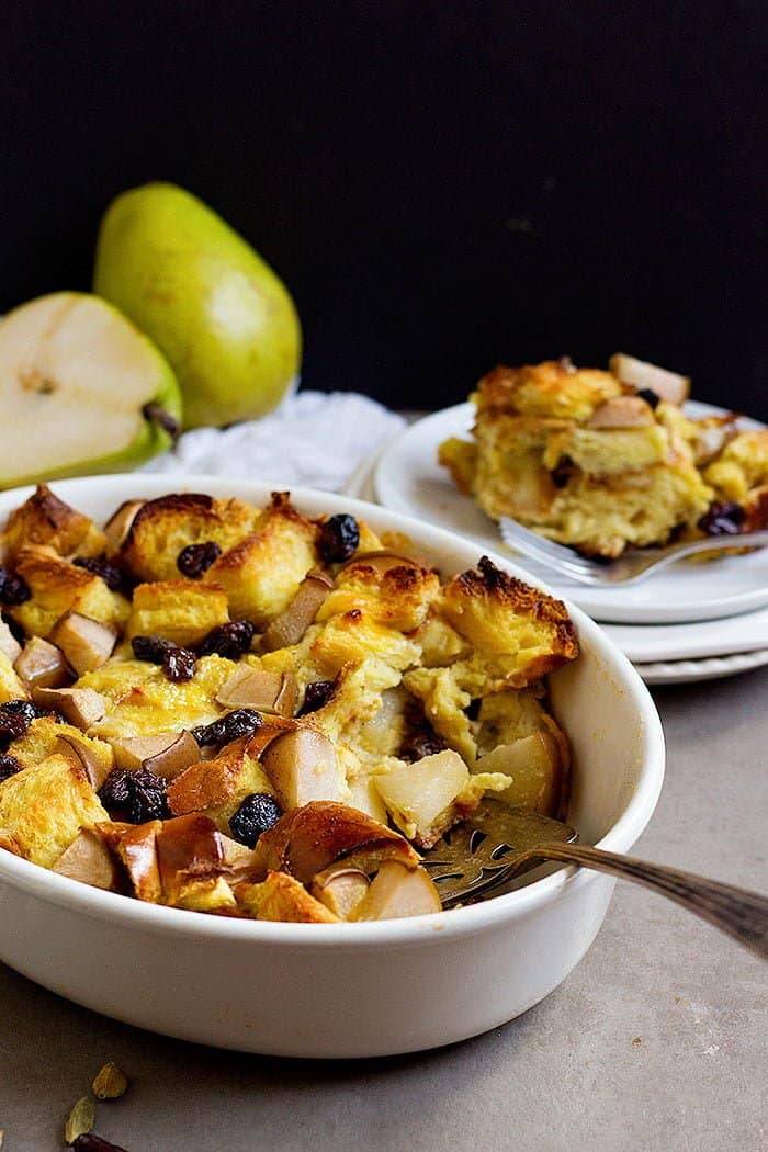 Challah bread pudding - cut into the bread pudding and plate. Serve the bread pudding warm with maple syrup. 