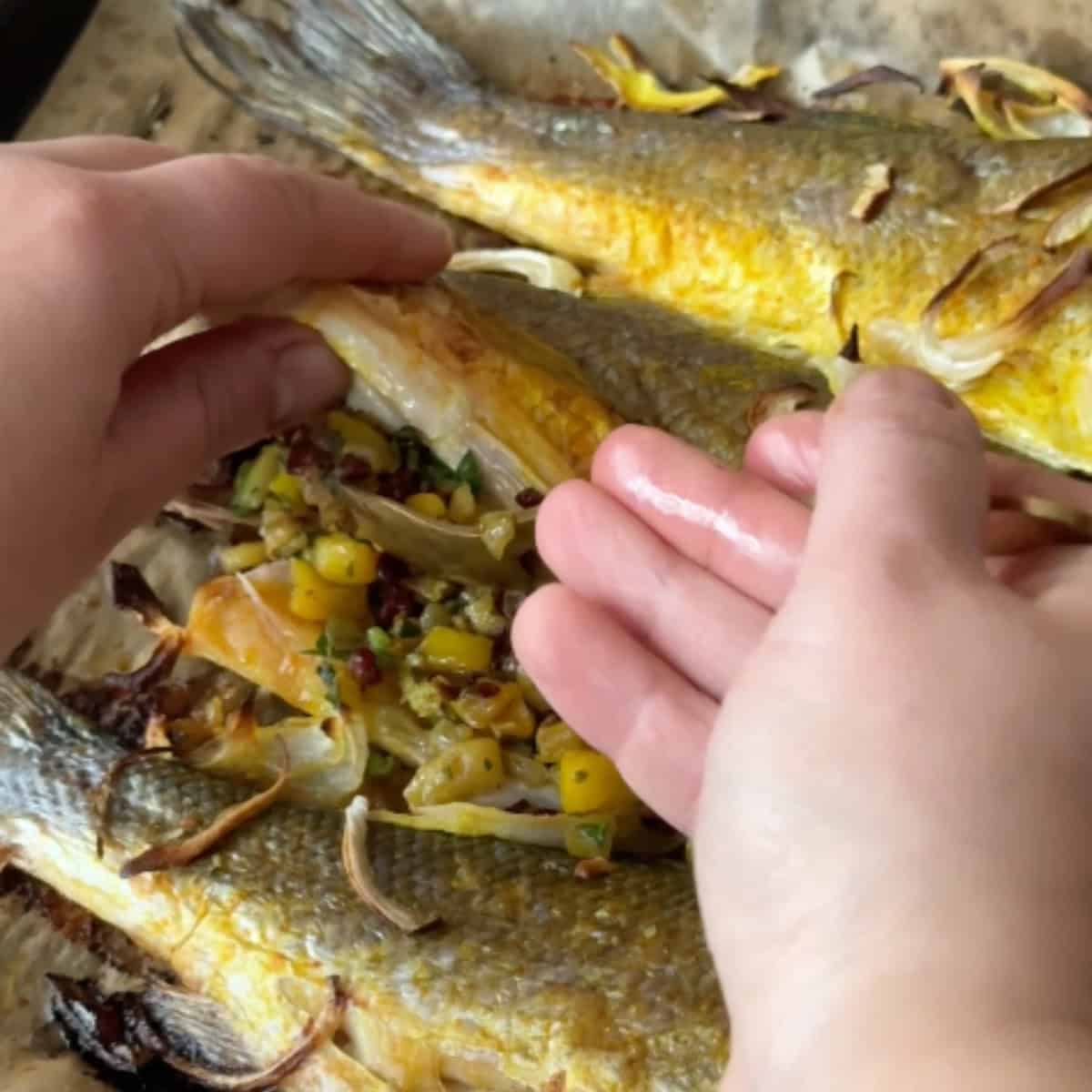 Prepare the filling: While the fish is roasting, saut&eacute; the onion until translucent. Add in the garlic and bell pepper and cook for a few minutes. Add in the oregano, salt, pepper and turmeric. Cook for 5 more minutes. Add in the barberries, walnuts and chopped parsley. Stir and cook for a few minutes, turn the heat off and set aside.&nbsp;