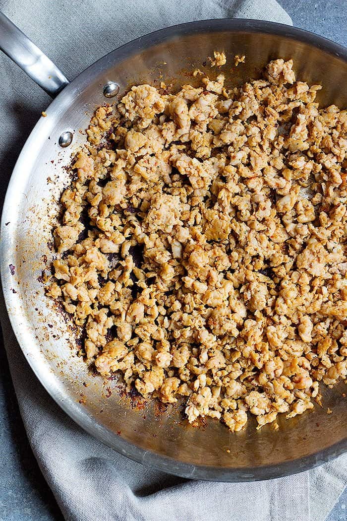 To make Breakfast Pizza with Sausage, start browning sausage.