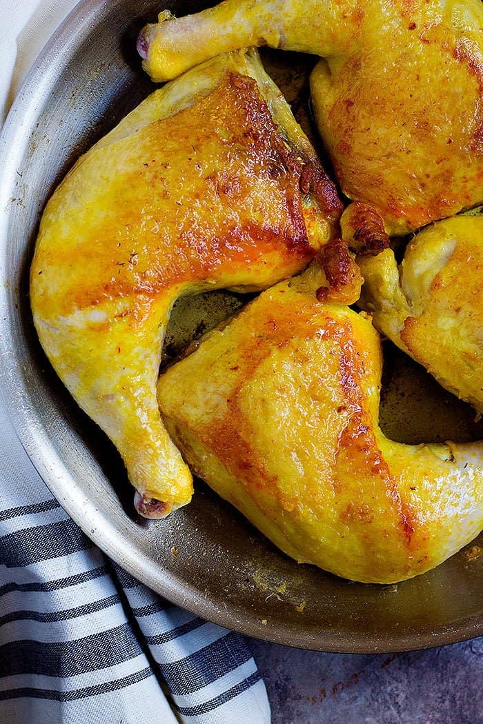 To make this Persian Chicken Recipe, sear the chicken thighs in a pan until the skin is golden. 