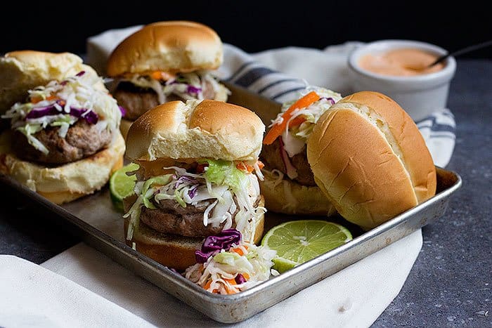 Thai Turkey Burgers are a lighter version of an all time favorite dish. Juicy turkey patties flavored with Thai spices and paired with a delicious Thai coleslaw make the perfect meal!