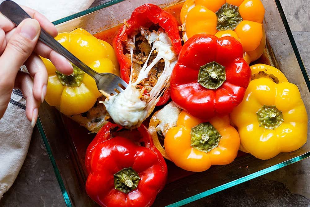 Authentic Italian Stuffed Peppers baked stuffed peppers recipe is easy and very delicious. Top stuffed bell peppers with mozzarella cheese.