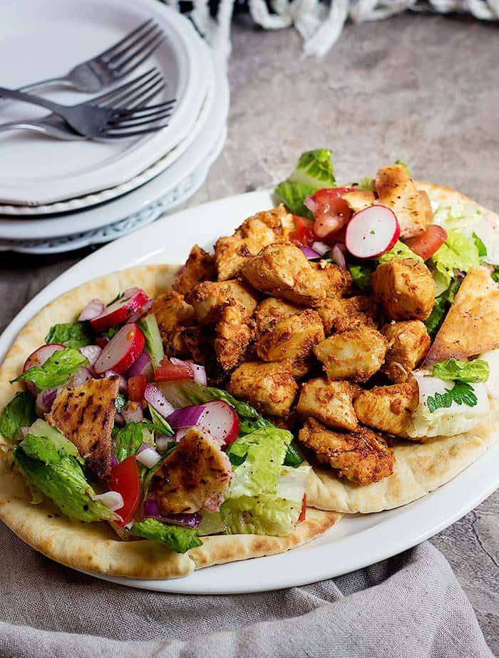 Shish tawook chicken kabob is a great grilling recipe served with fattoush salad. 
