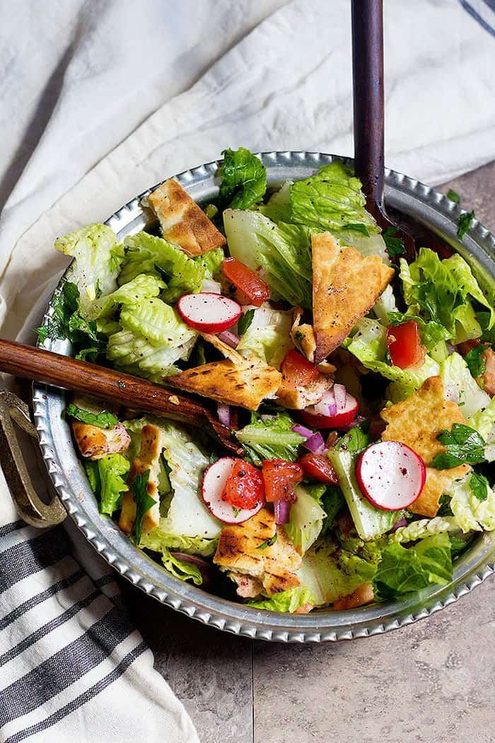 Fattoush is a Lebanese salad made with fresh lettuce, tomatoes and other veggies. 