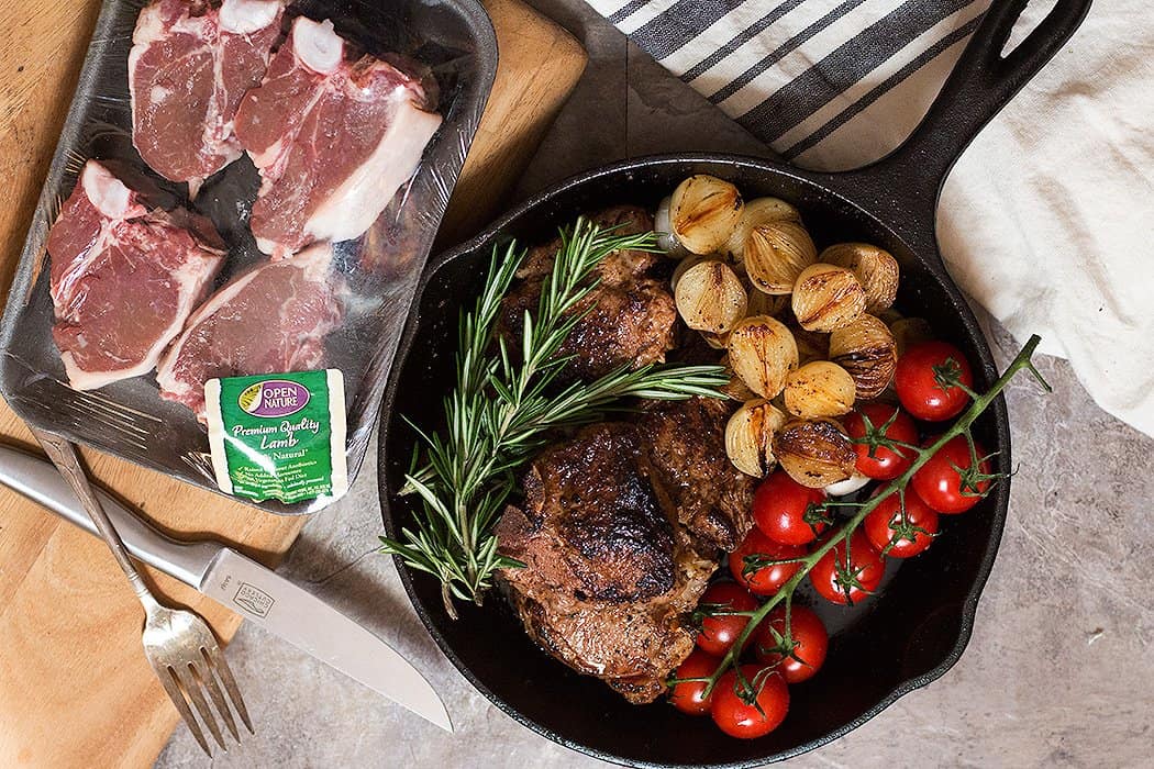 lamb loin chops seared in a skillet make a tasty dinner.
