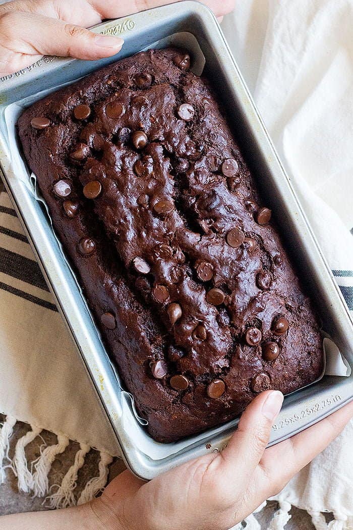 This double chocolate banana bread is moist and super delicious. Make this tasty chocolate banana bread for breakfast or dessert! 