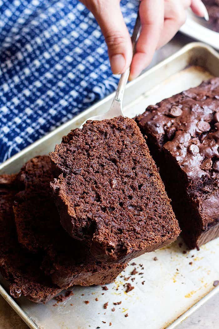 Chocolate banana bread is delicious and is topped with chocolate chips. 