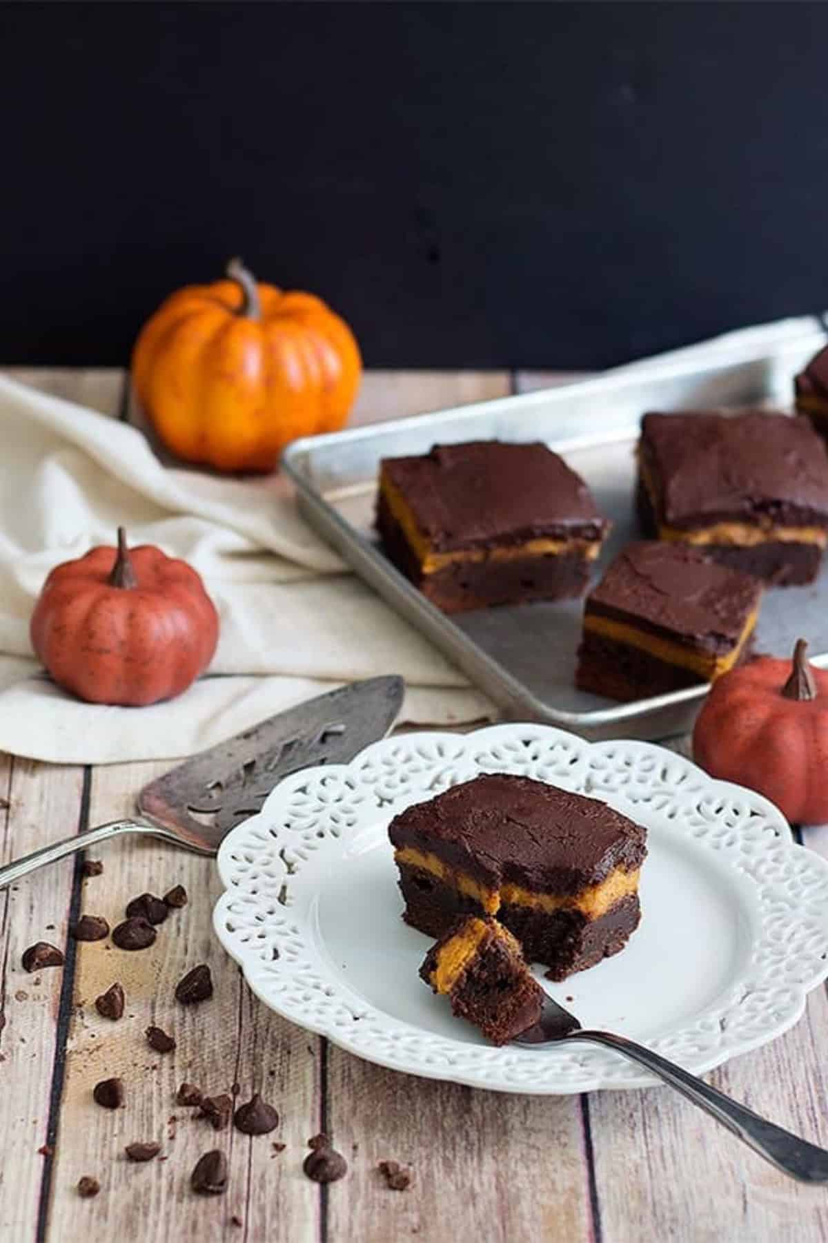 Pumpkin brownies with a pumpkin pie layer are the best autumn dessert! 