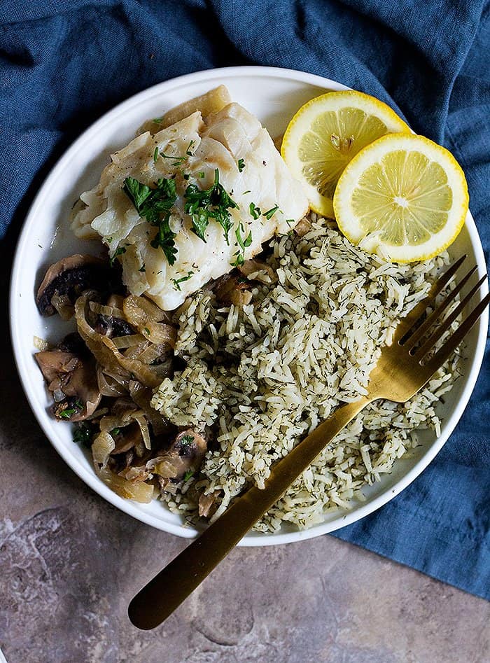 Serve pan seared cod fillets with dill rice, mushrooms and fennel. 