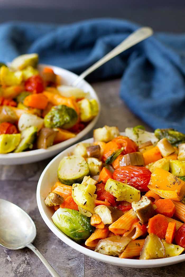 Roasted vegetable pasta is a delicious weeknight meal that's bursting with amazing flavors. This vegetarian pasta recipe is easy, quick and perfect for a family meal.