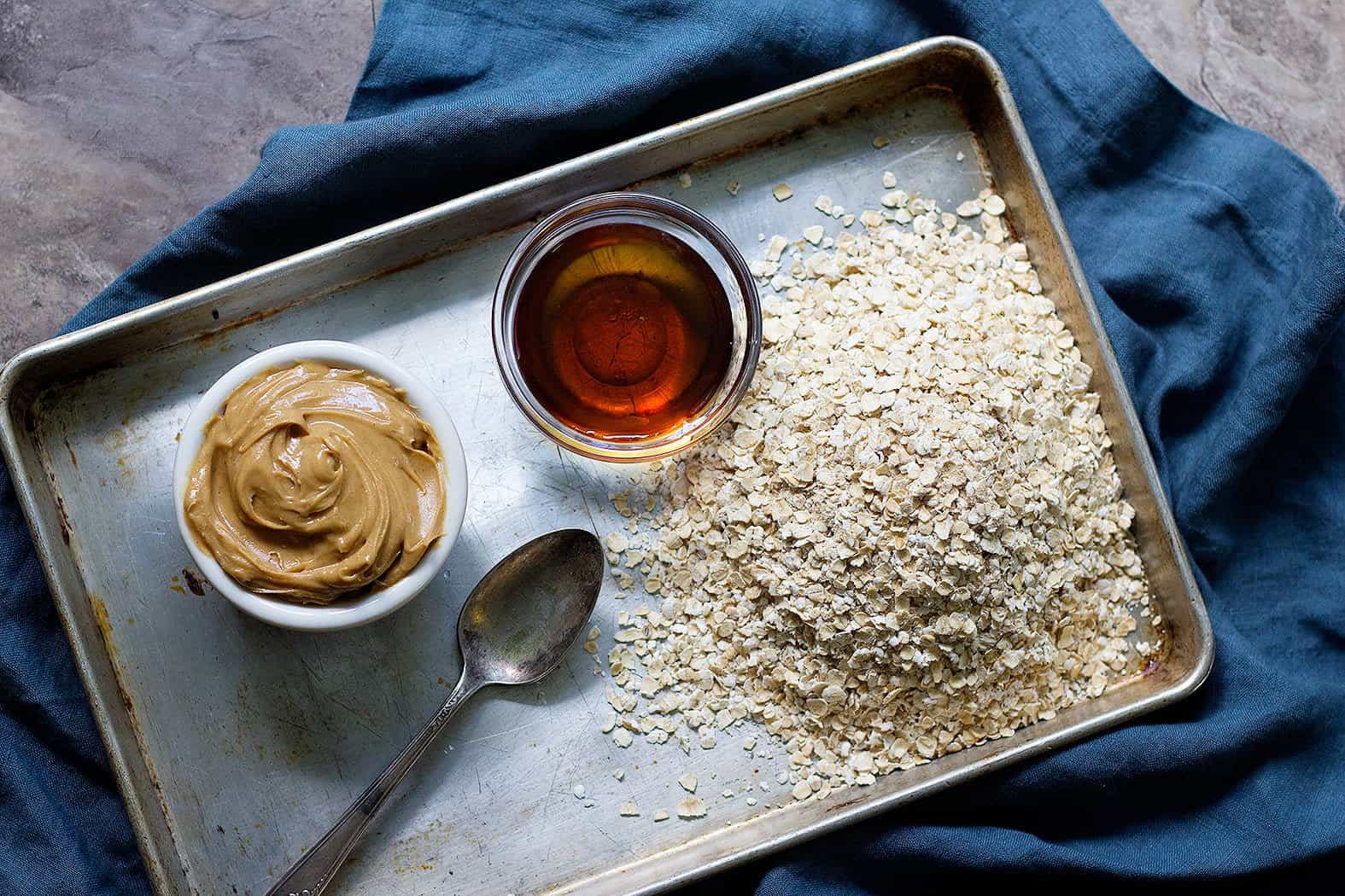 To make easy healthy oatmeal cookies without sugar you need oatmeal, peanut butter and maple syrup.