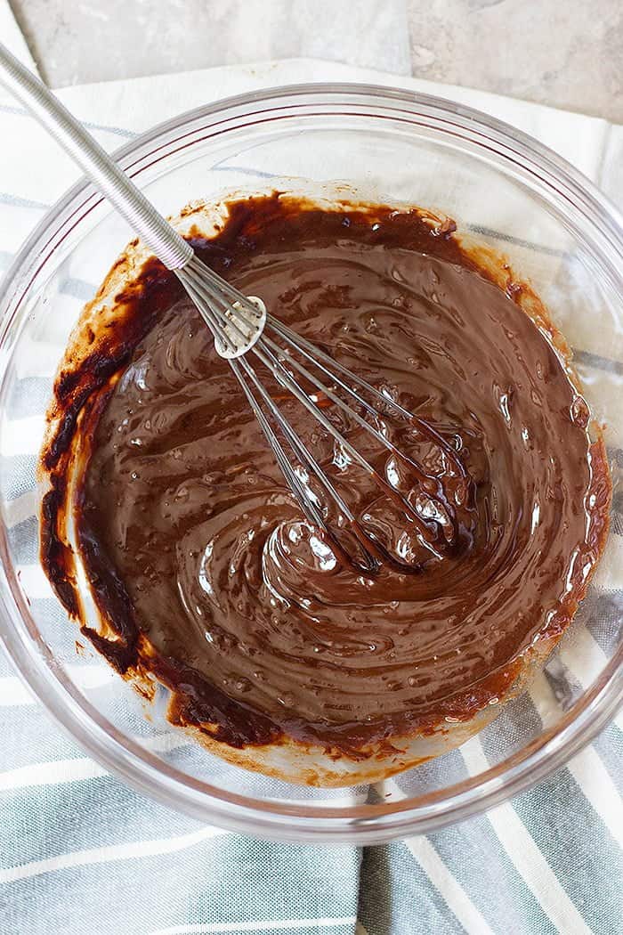 Once chocolate and butter are melted, add sugar. 