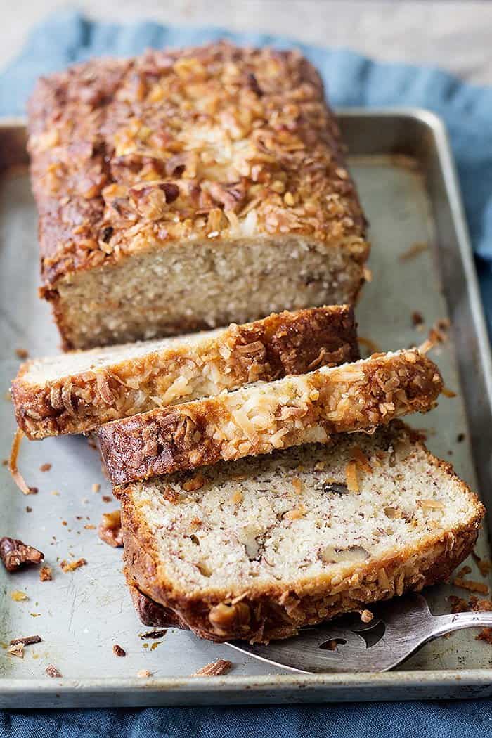 Easy and delicious coconut banana bread slices on a pan. 