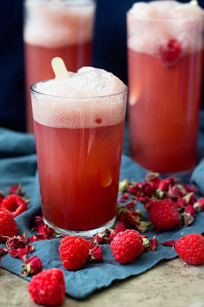 This delicious fruit punch recipe is going to be your favorite holiday drink. This Rose Raspberry Party Punch is super easy to make and perfect for parties and gatherings!