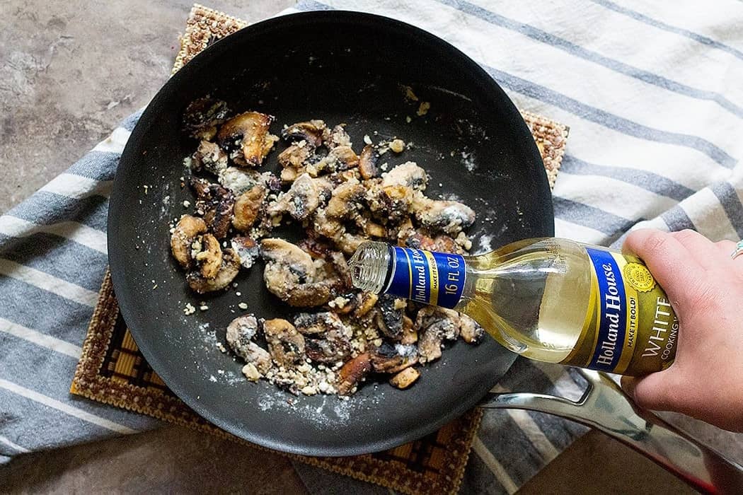 Saute mushrooms in butter and add cooking wine to it. 