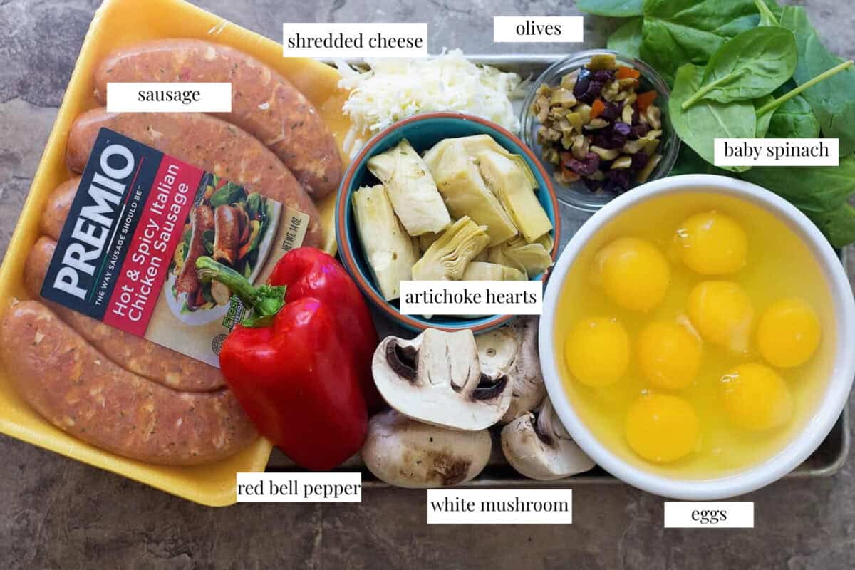 These sausage egg breakfast muffins are made with sausage, artichoke. mushrooms, olives and eggs.