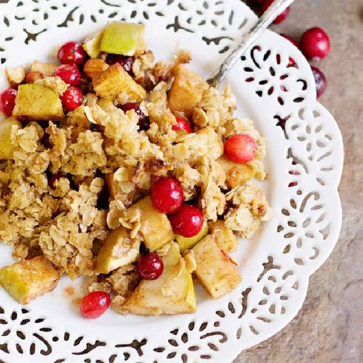 Apple Cranberry Almond Crisp is great for chill evenings. Tart apples and juicy cranberries bring together the perfect texture and flavor. This dish gets better with every bite!
