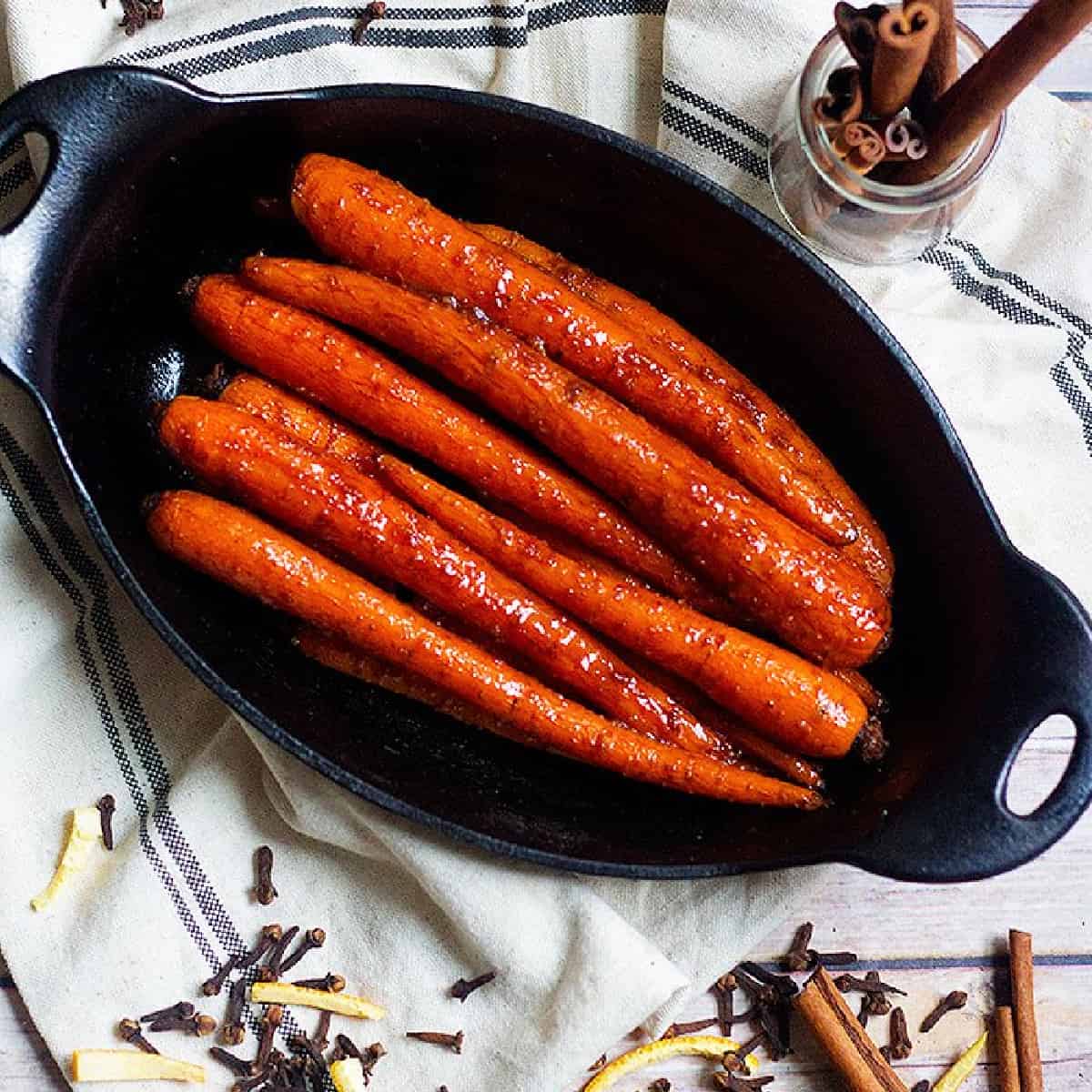 Honey Butter Carrots are the perfect side dish for any dinner table. These carrots are flavored with cinnamon and warm spices, perfect for any occasion! 
