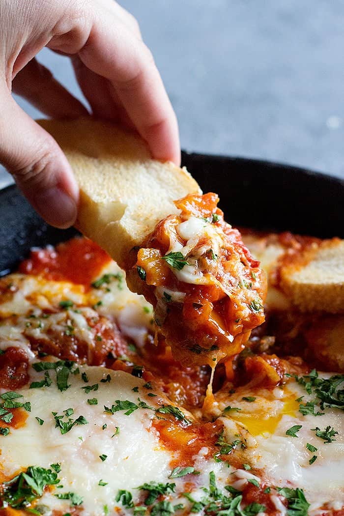 Italian baked eggs are great for the weekends. This breakfast egg recipe is delicious and is cooked in a truly amazing tomato sauce.