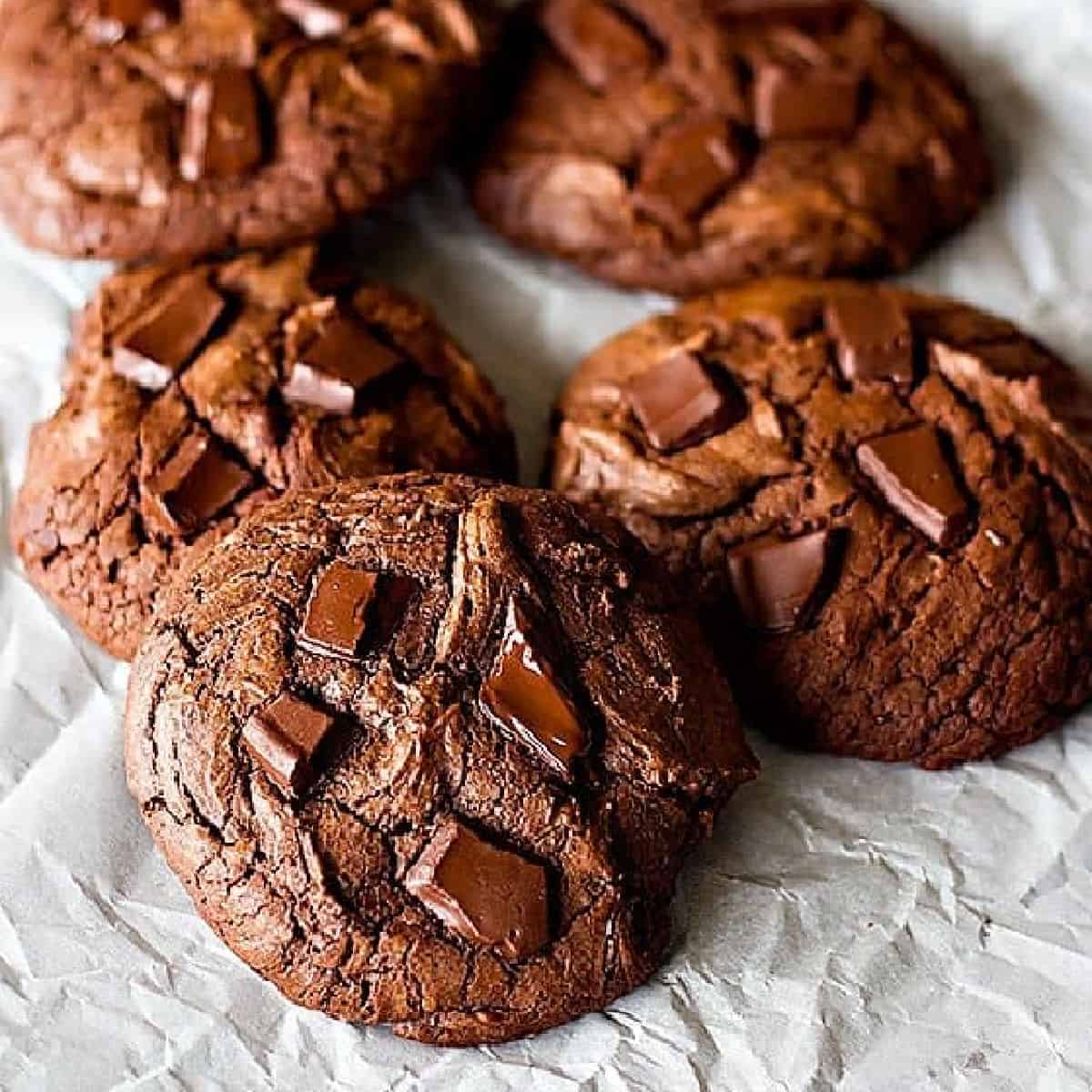Ready in 30 minutes, these chewy double chocolate cookies will cure all your chocolate cravings in one bite. These double chocolate cookies are crispy on the edges and very chewy on the inside with big chocolate chunks in every bite!
