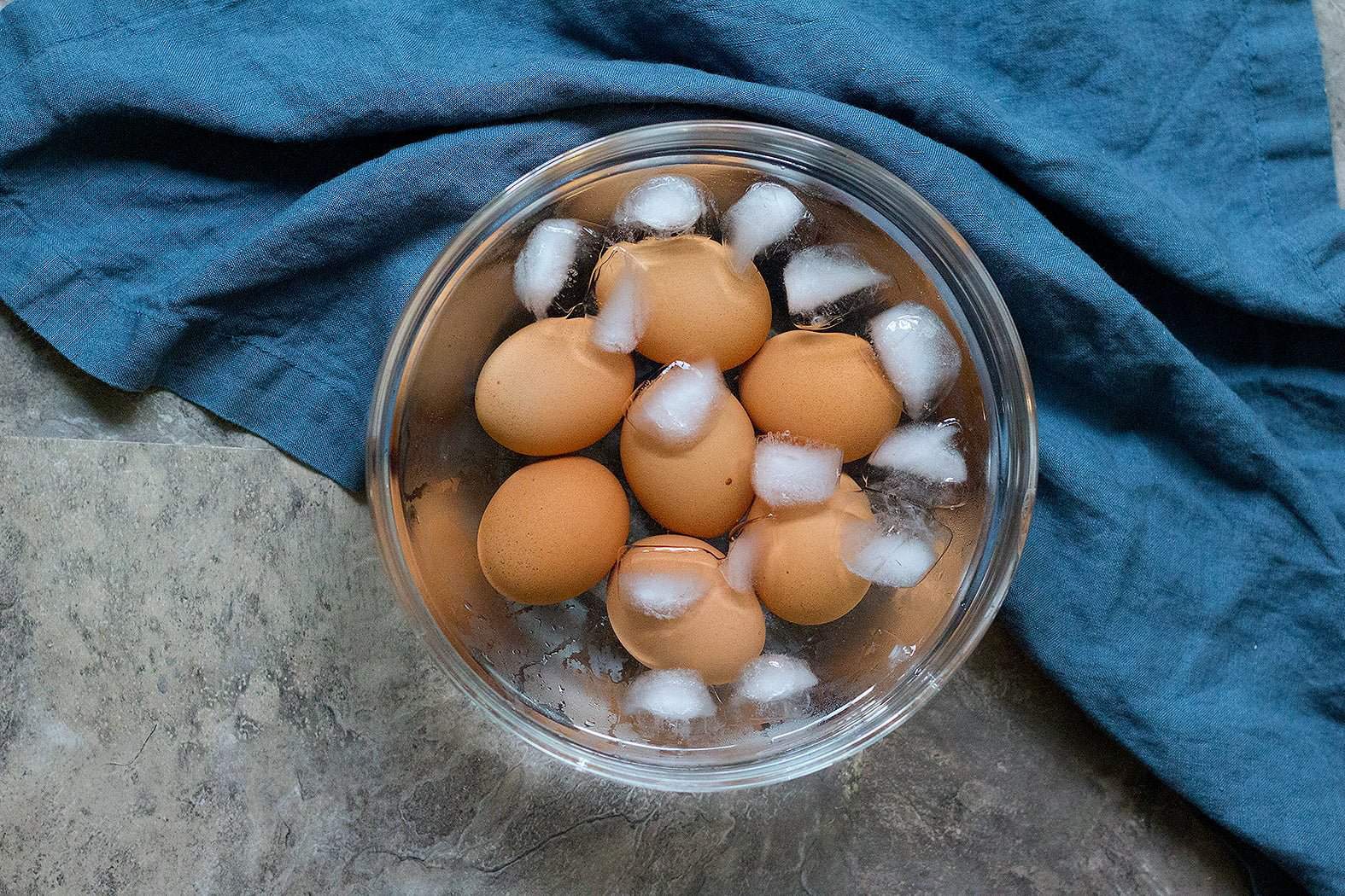 Once the lid is unlocked, take the eggs out of the instant pot very carefully and put them in an ice water bath for 5 minutes. Peel and enjoy right away or store in the fridge.