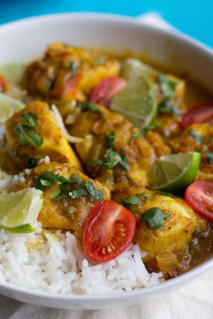 top fish curry with tomatoes lime and cilantro