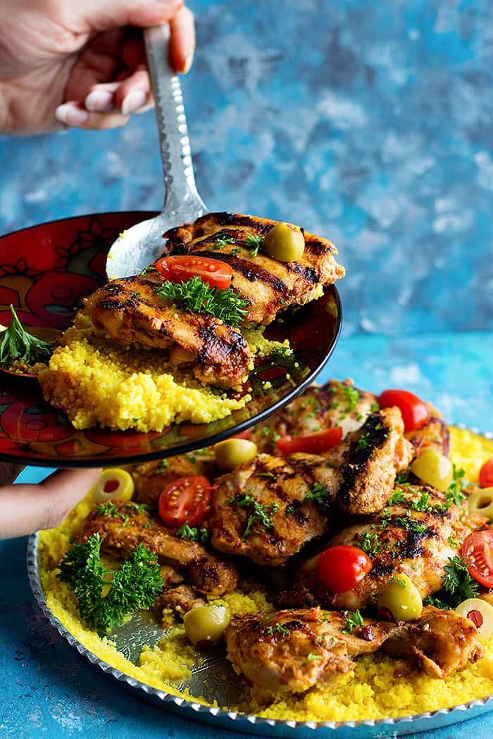 This delicious harissa chicken is the perfect weeknight meal served with saffron infused couscous. Learn how to make this spicy chicken recipe with a twist.