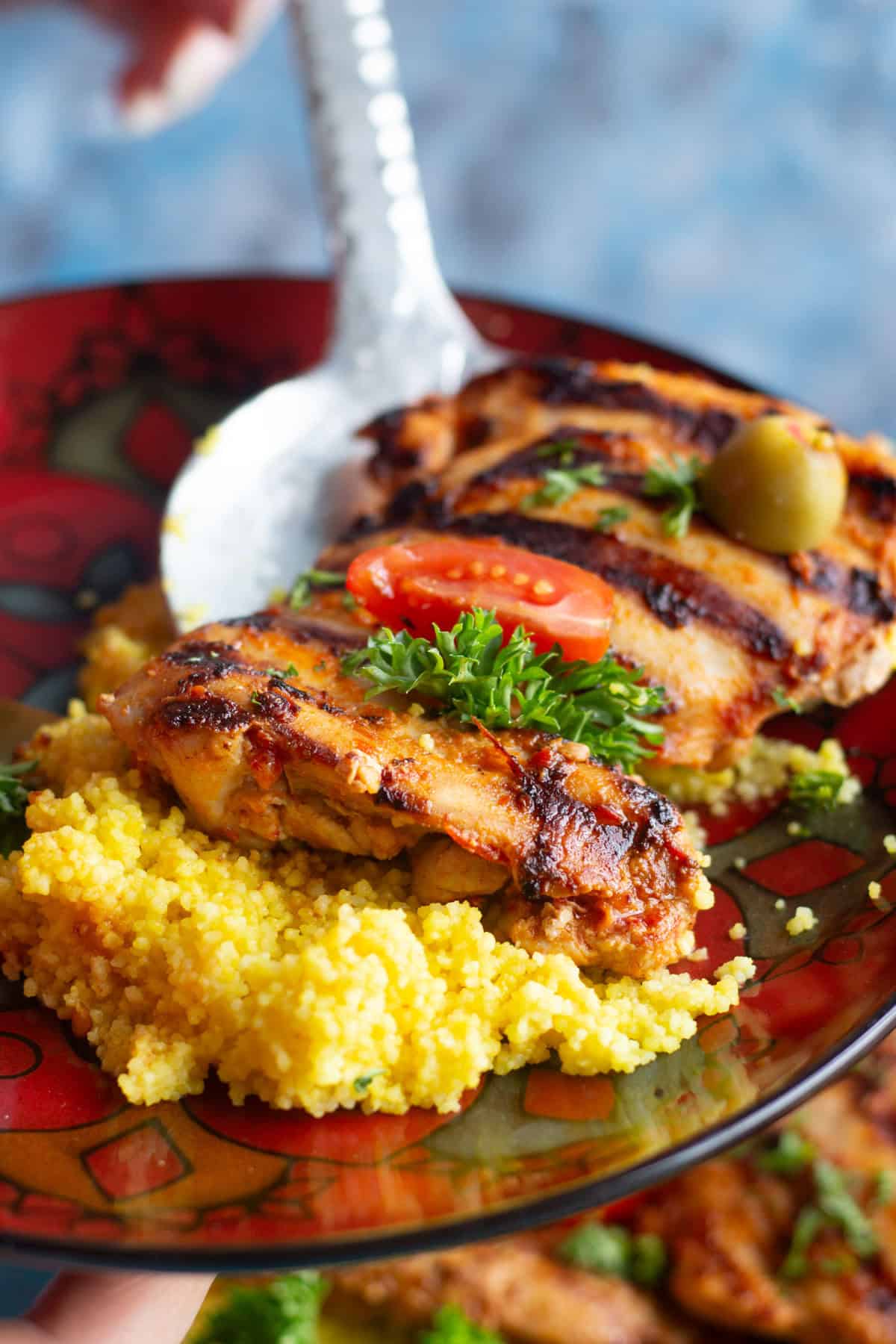This delicious harissa chicken is the perfect weeknight meal served with saffron infused couscous. Learn how to make this spicy chicken recipe with a twist.&nbsp;
