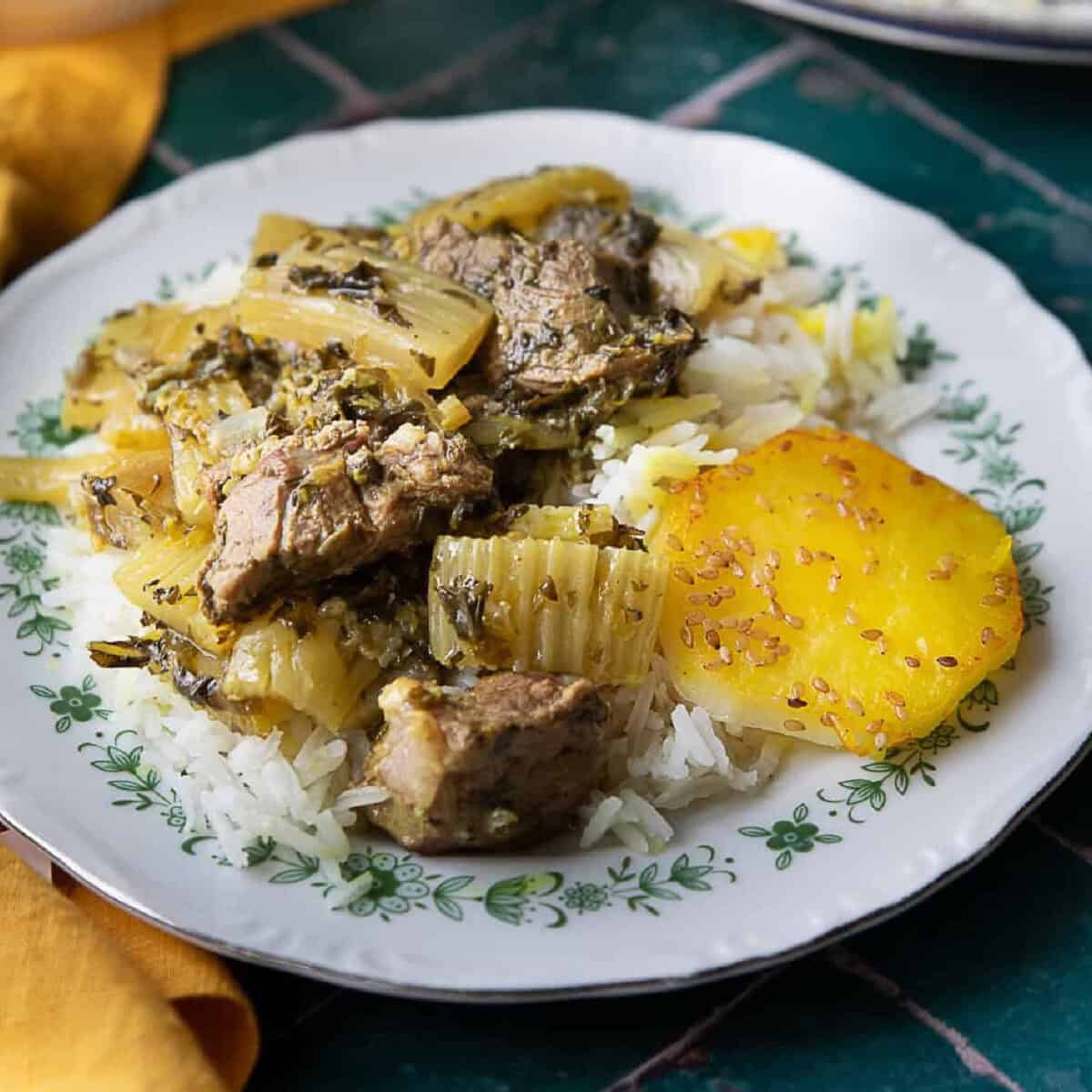 Khoresh karafs Persian celery stew served with rice.