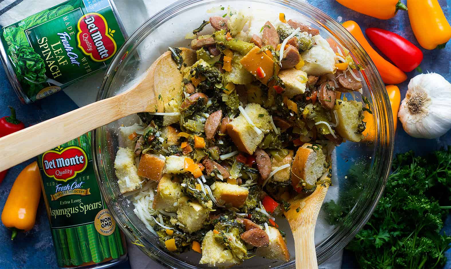 Mix bread cubes with vegetables in a large bowl to make bread pudding with sausage. 