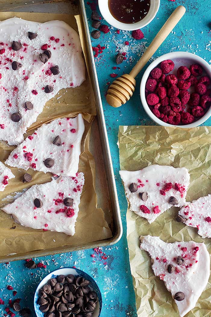Yogurt bark is a light and delicious snack made with a handful of ingredients. This Greek yogurt bark is so simple and easy that even a kid can make it.