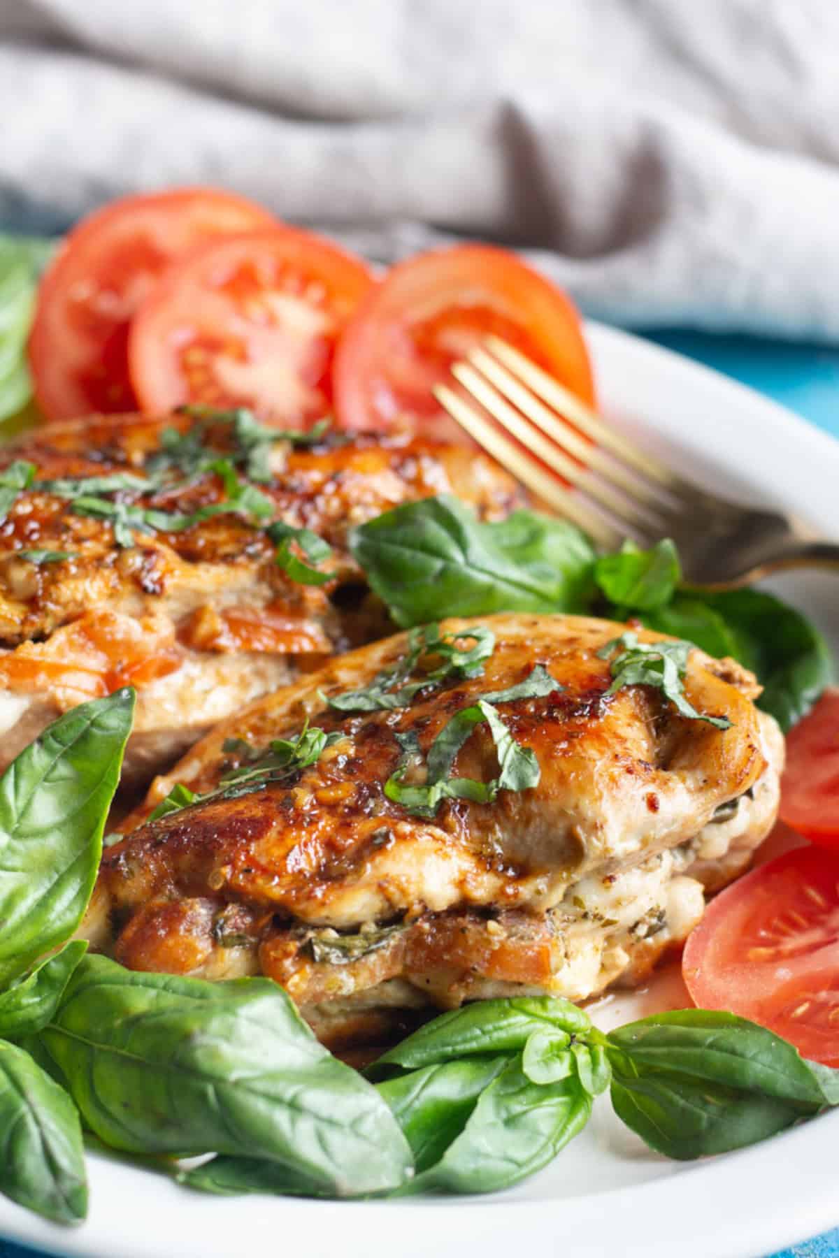 Caprese stuffed chicken breast is easy and packed with flavor. Juicy chicken breast stuffed with cheese, tomatoes and basil makes a delicious meal.&nbsp;